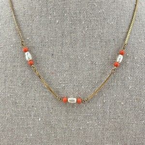 Vintage AVON gold tone chain necklace with rice pearls and coral colored beads